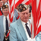WWII veteran Herbert Macallum, seen here marching in a Wichita, KS, Memorial Day parade.